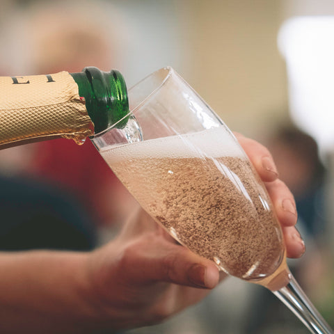 Champagne being served in The Green Room