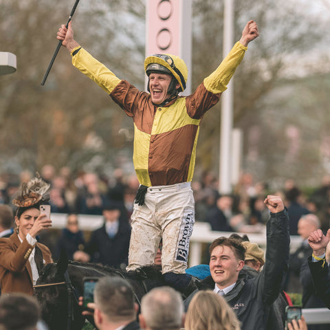 Jockey celebrating a win at The Cheltenham Festival